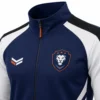 Custom tracksuit jacket detail showing embroidered logo, zipper and reinforced stitching