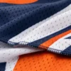 Close-up of breathable mesh fabric used for custom reversible basketball jerseys.